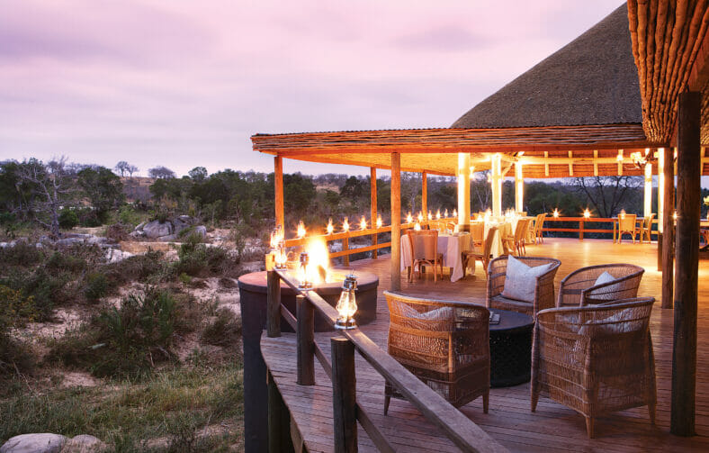 Londolozi Founders Camp Deck with Lanterns at Dusk